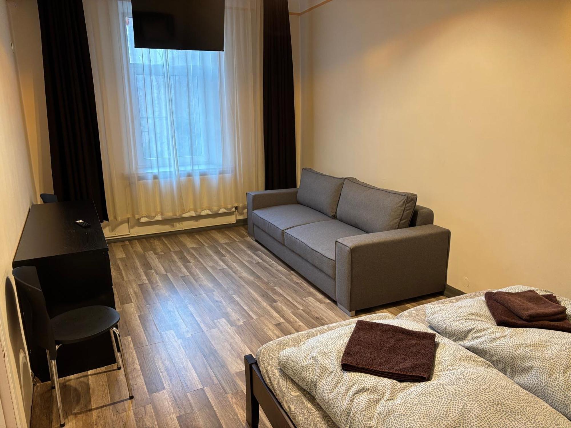 Aparthotel Riga Exteriör bild A typical room at the hostel