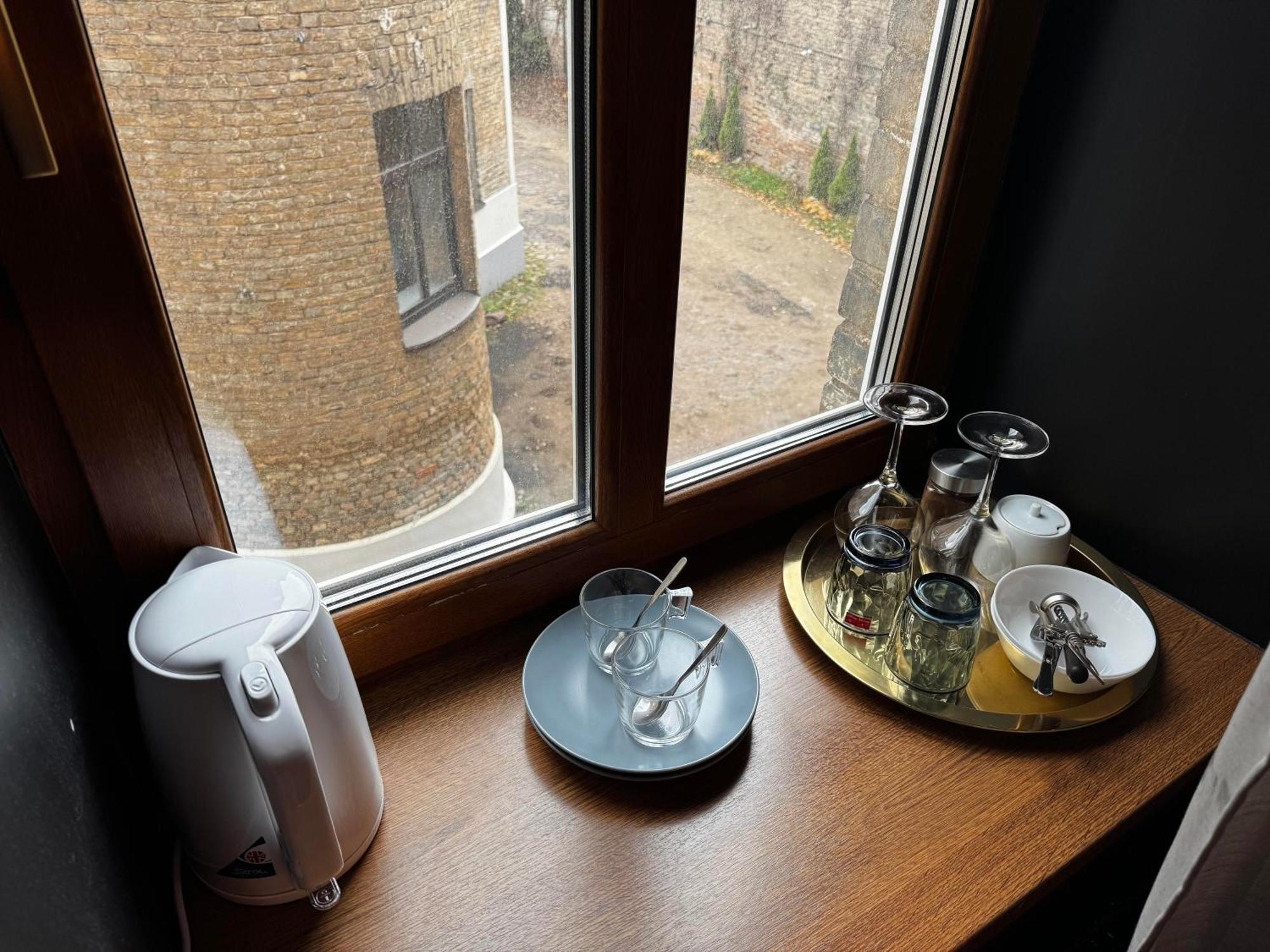 Aparthotel Riga Exteriör bild A tea tray in a hotel room